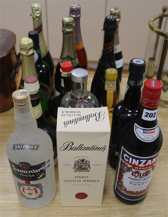 Fifteen assorted bottles of wines, spirits and liqueurs, including Champagne, Vodka, Whisky, Benedictine and Grand Marnier.